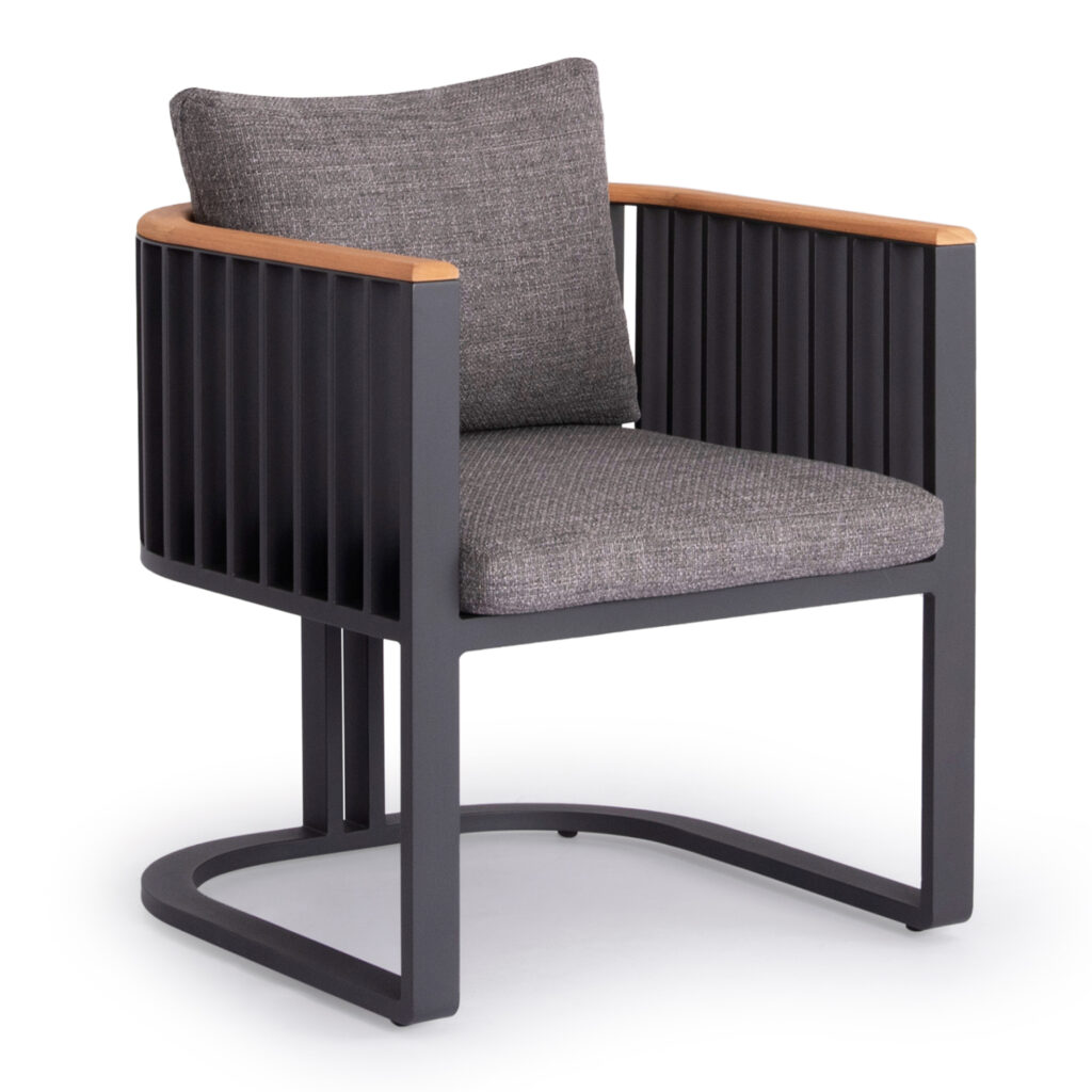 We present to you an exceptional outdoor dining armchair of the ETERNITY series. A series that, together with others, raises the bar of quality and aesthetics that we offer you, both for the home and for any professional space! With unparalleled quality of construction and materials, it will upgrade the image in any space you wish. The frame is made of aluminum in ANTHRACITE color and the cushions are in LIGHT GREY color. The teak-upholstered armrests are another touch of luxury in this unique armchair, which also stands out thanks to the unique design of its base!